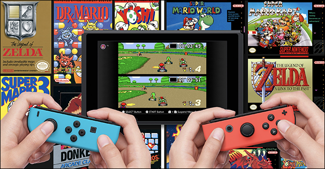 Две пары рук держат Nintendo Switches во время игры 