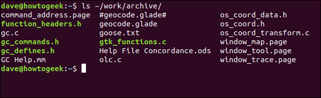 The "ls ~/work/archive" command in a terminal window.