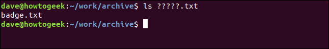 A "ls ?????.txt" command in a terminal window.
