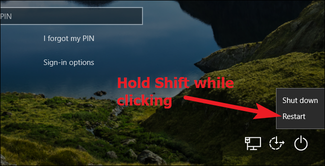 Удерживая Shift при нажатии кнопки перезагрузки в Windows 10